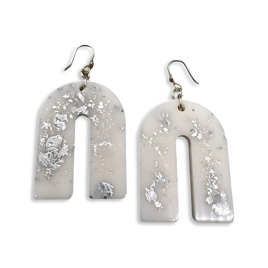 White arch earrings with silver flakes