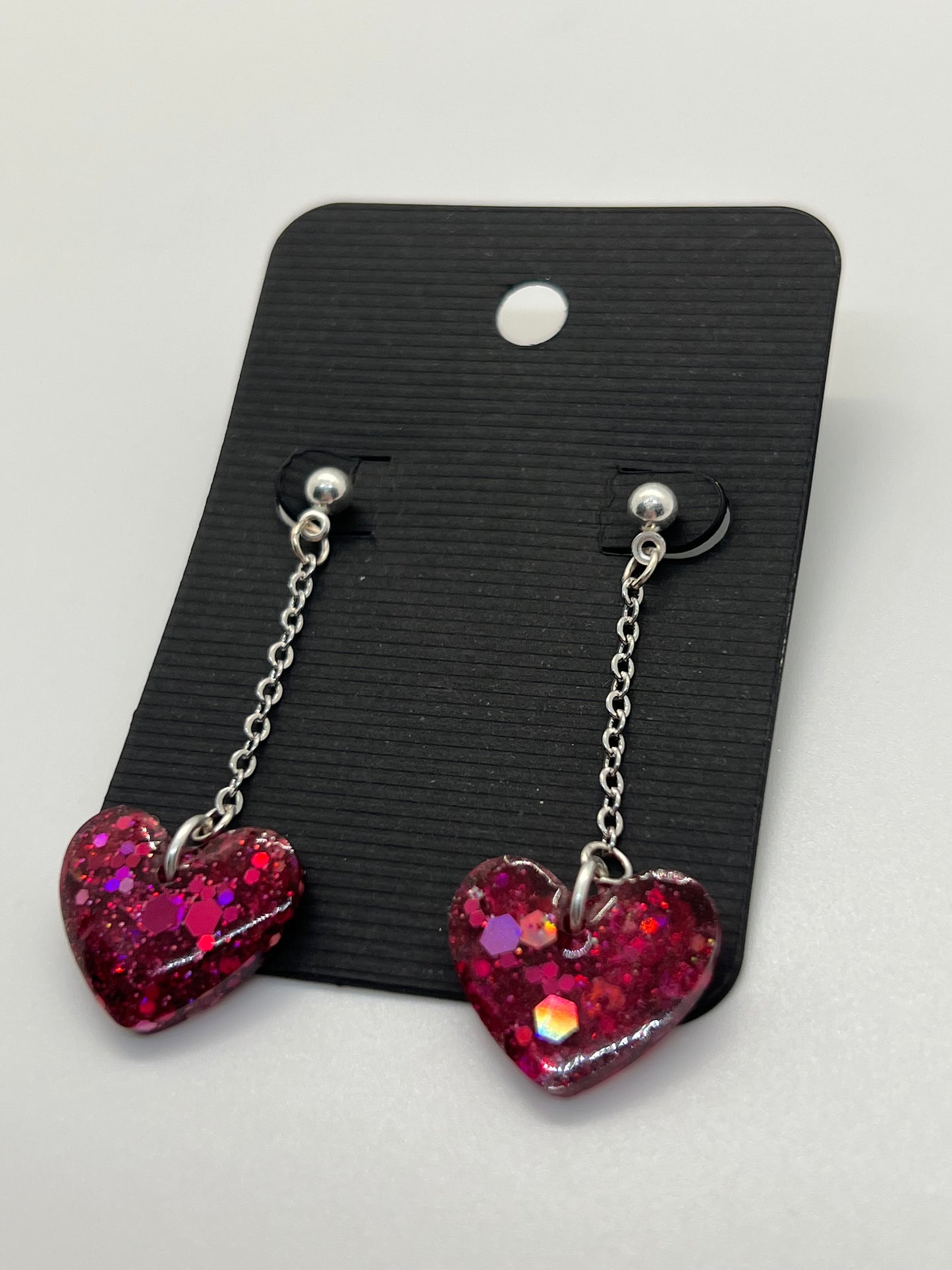 Dark pink heart earrings