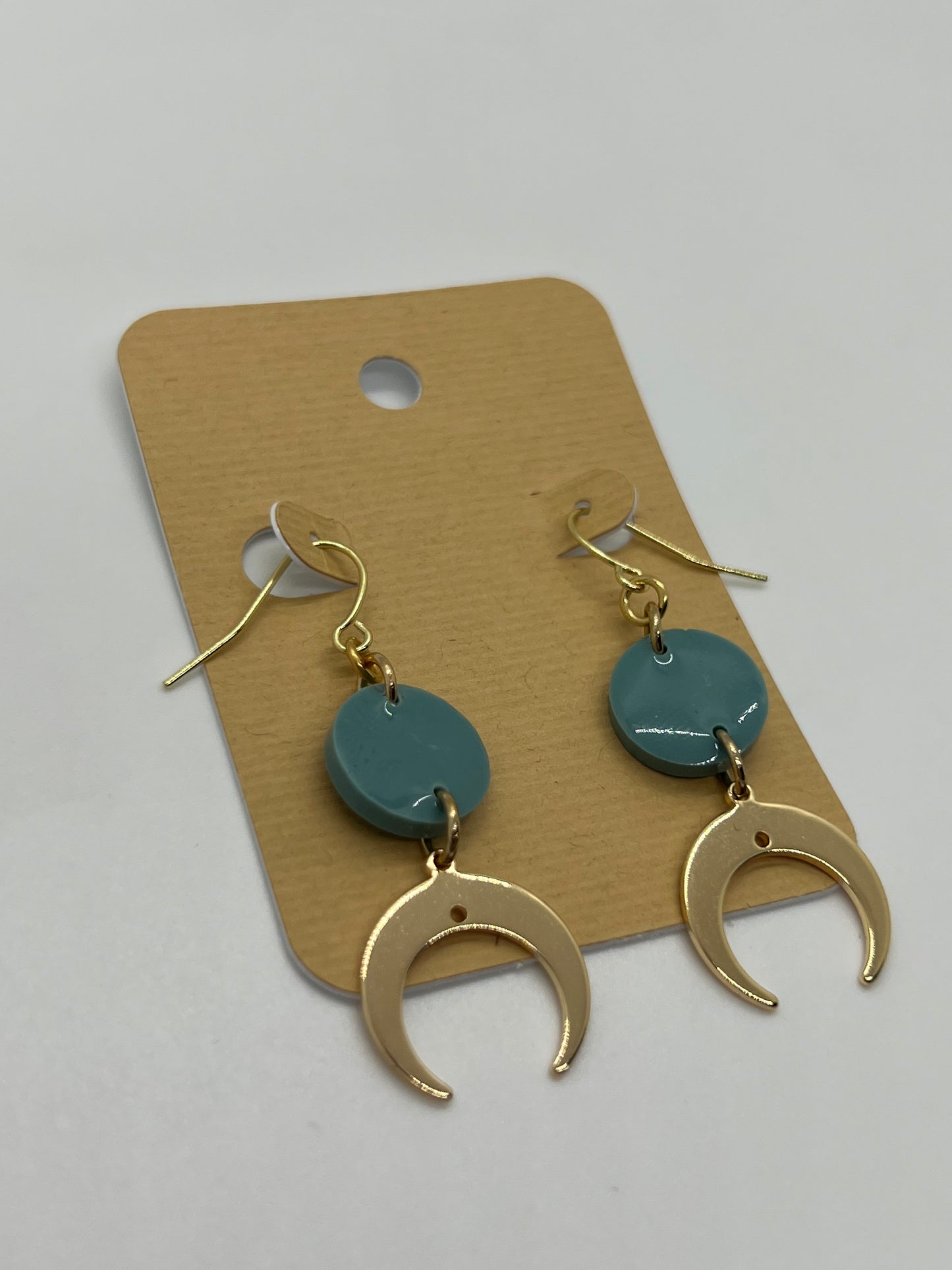 Cresent moon charms with small teal green round earrings