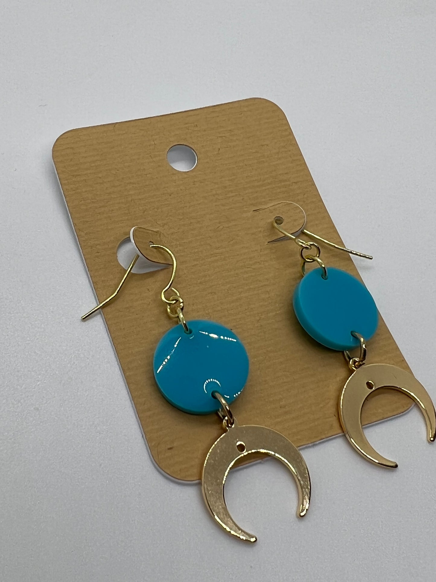 Cresent moon charms with small sky-blue round earrings