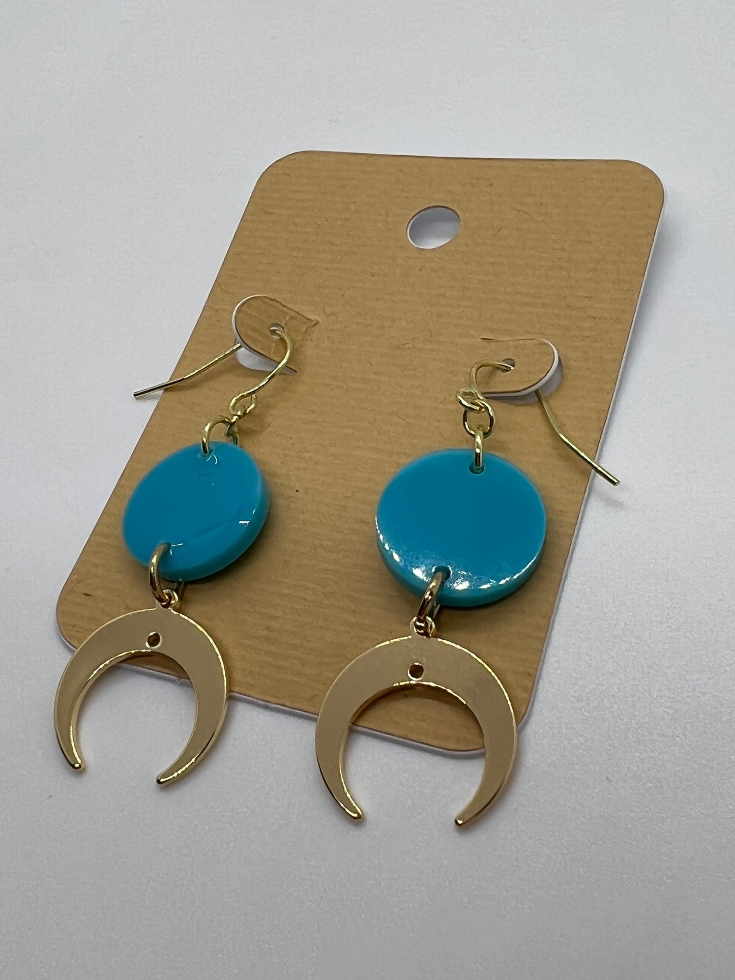 Cresent moon charms with small sky-blue round earrings