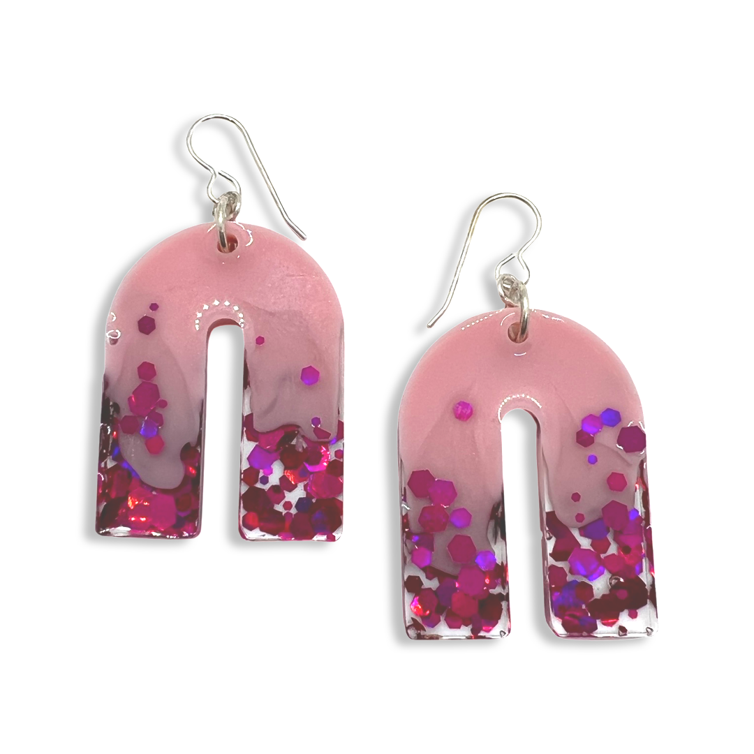 Large pink arch earrings