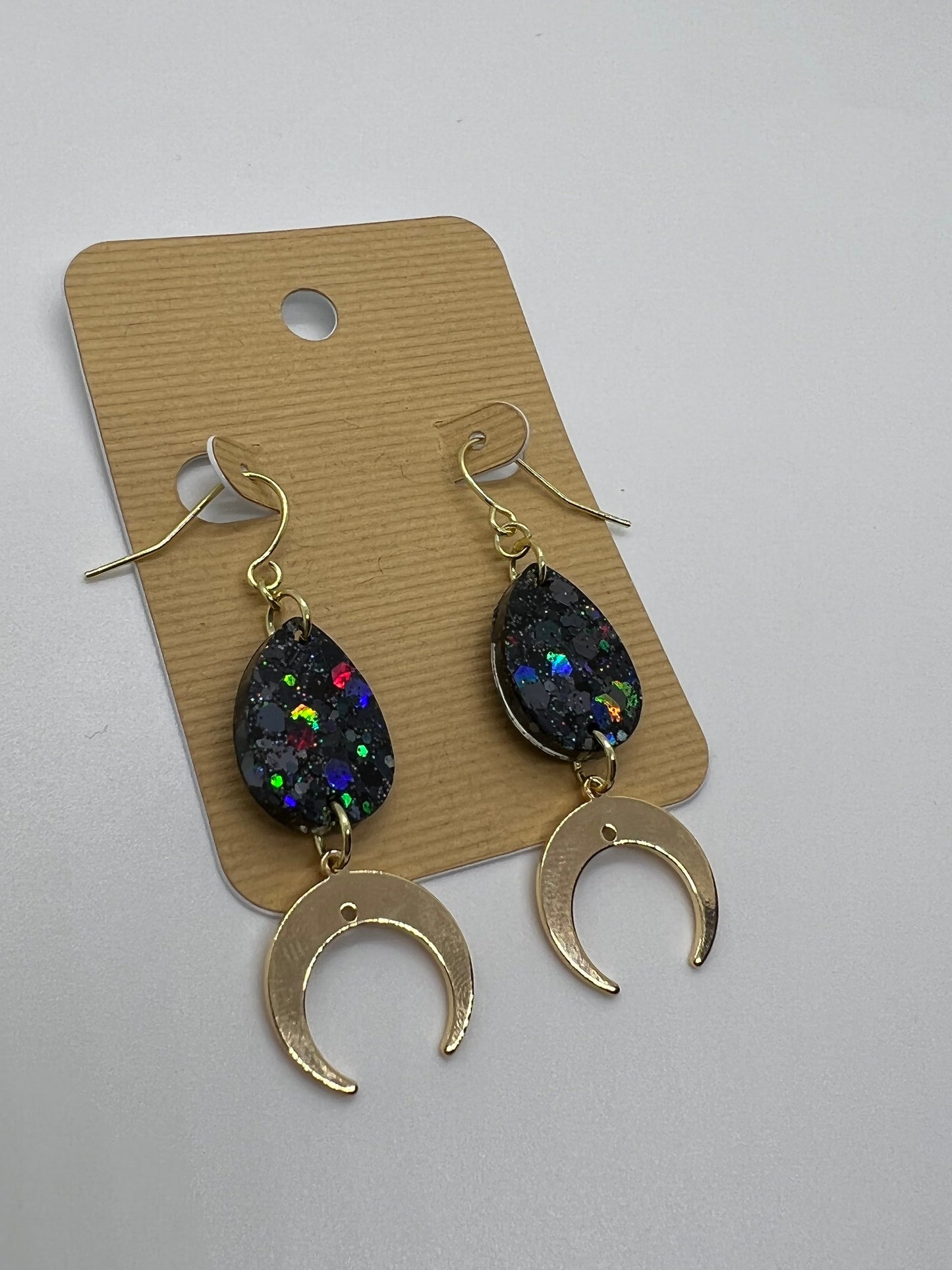 Black glitter tear drop with gold crescent moon charm