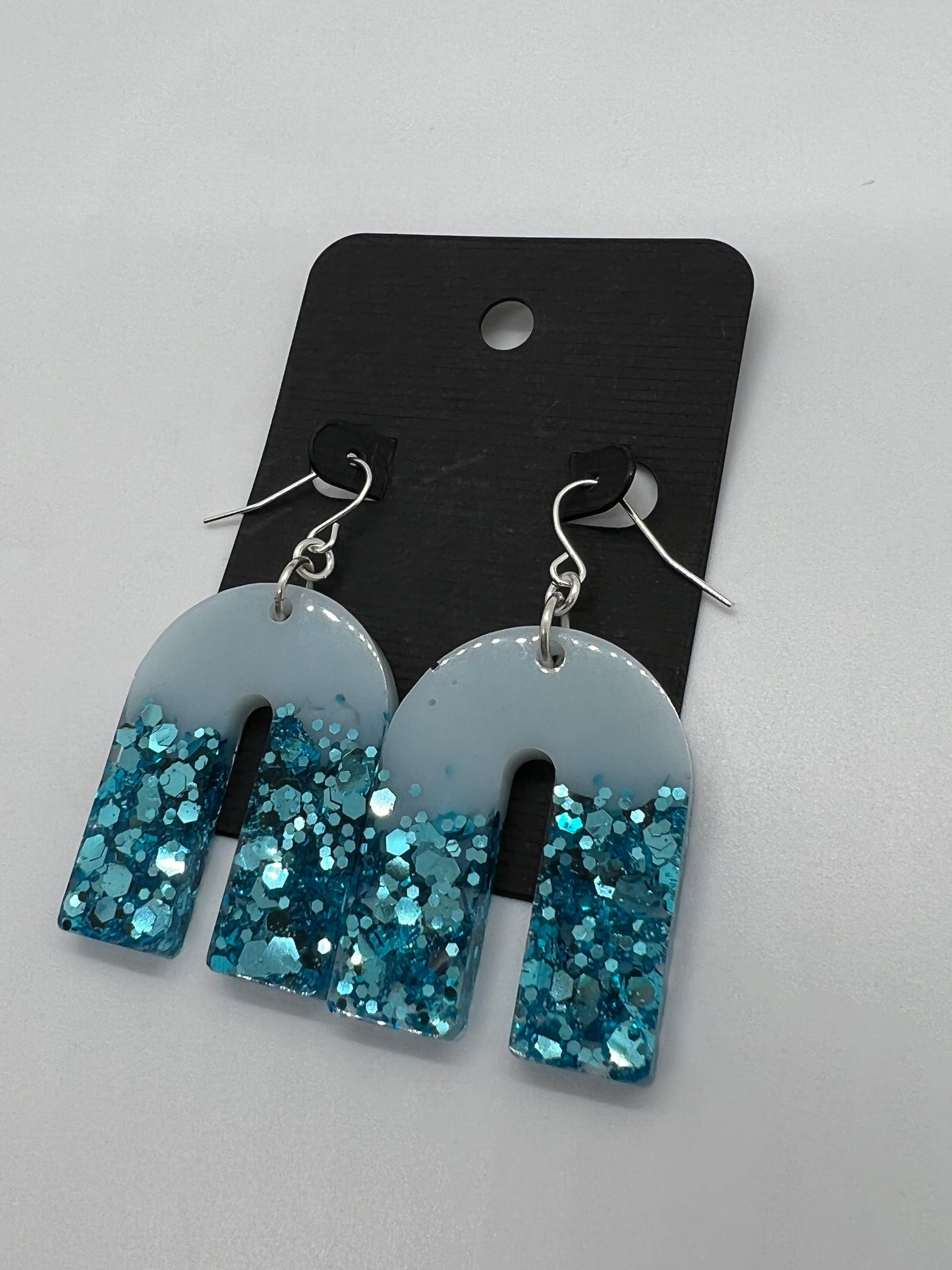 Large sky blue arch earrings