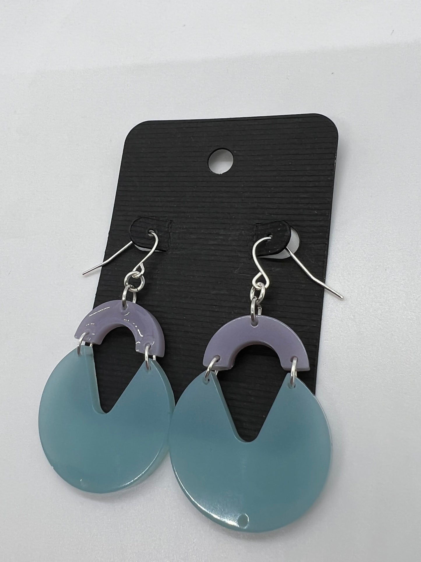 Teal circle cut-out earrings