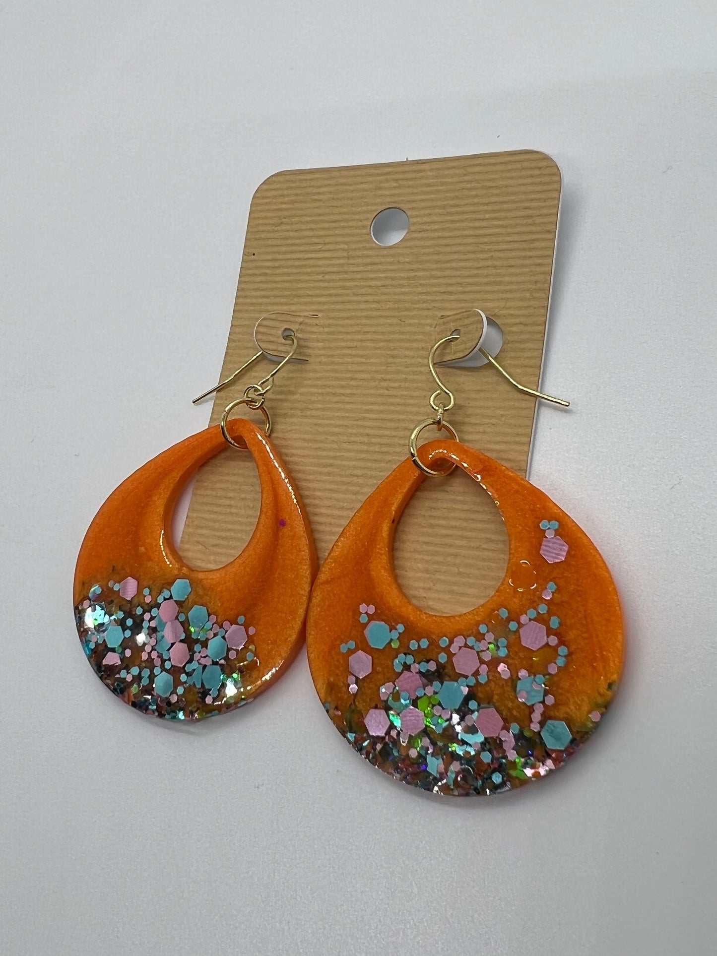 Orange tear drop cut-out earrings