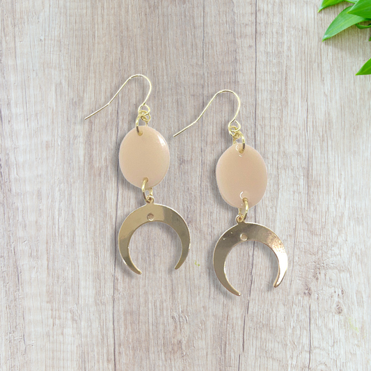 Beige oval with gold crescent moon charm