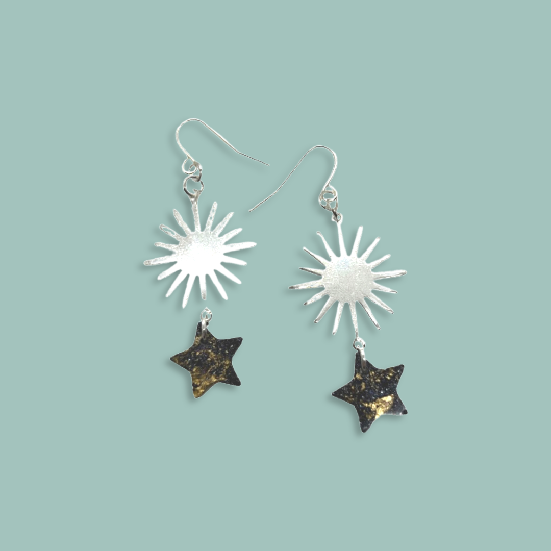 Silver sun charm with black & gold stars