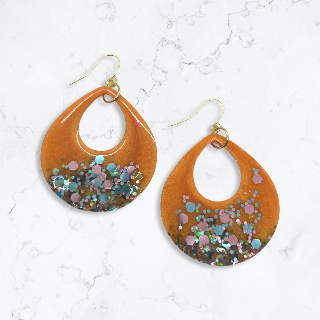 Orange tear drop cut-out earrings