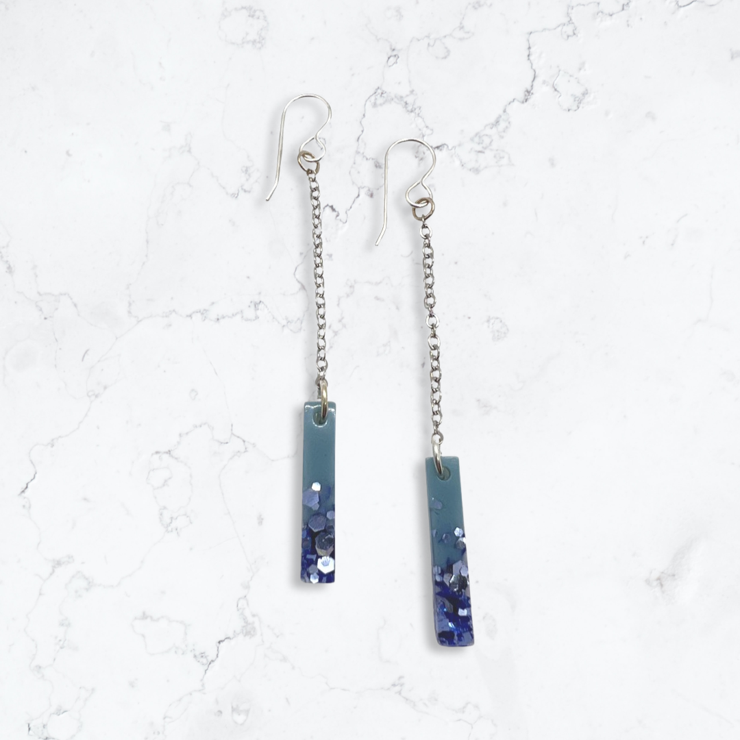 Thin blue with purple glitter rectangle dangle earrings