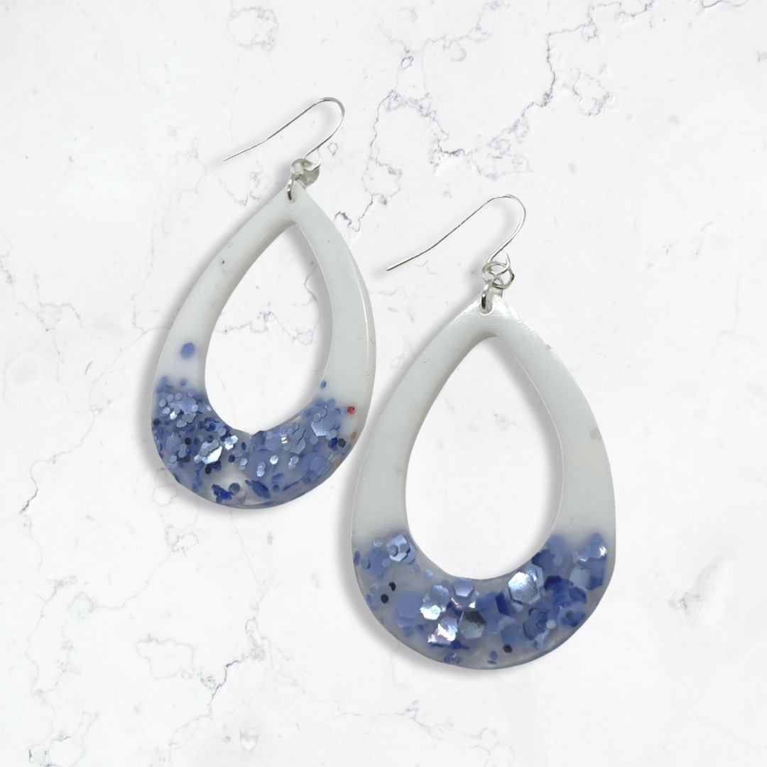 White with purple glitter tear drop cut-out earrings