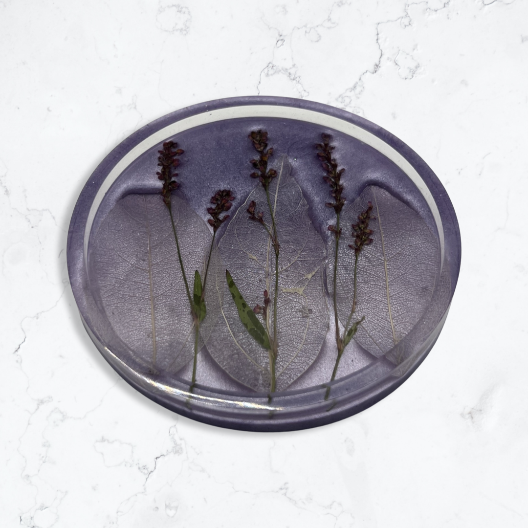 Lavender circle coaster filled with flowers