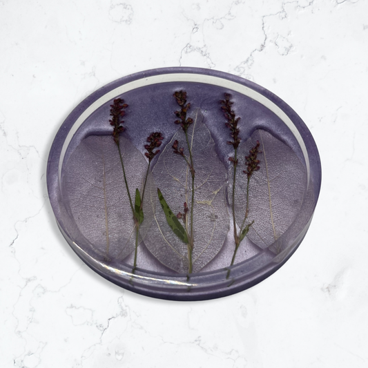 Lavender circle coaster filled with flowers