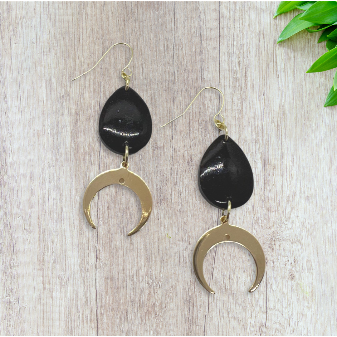 Black tear drop with gold crescent moon charm