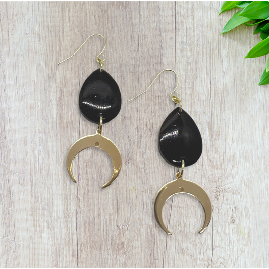 Black tear drop with gold crescent moon charm