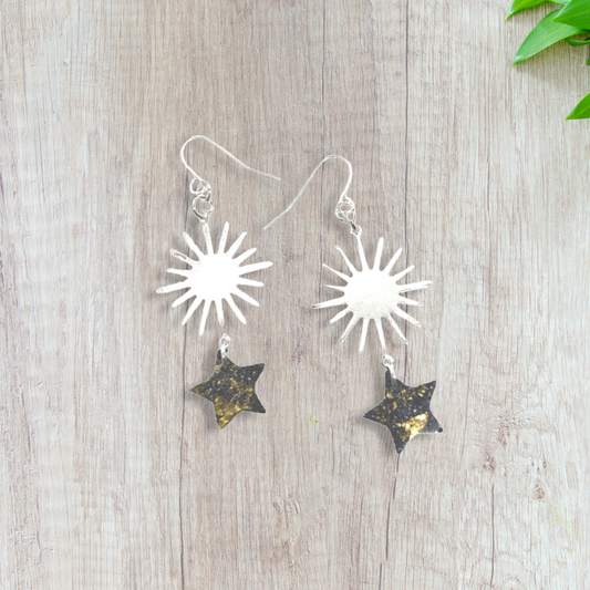 Silver sun charm with black & gold stars